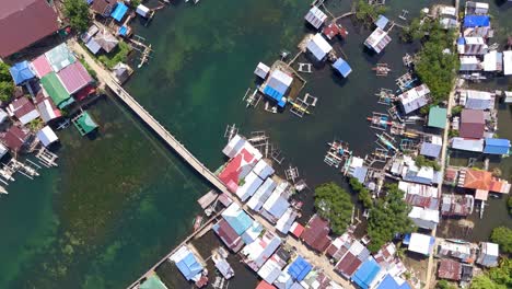 drone circling over fishing village in surigao del norte, philippines