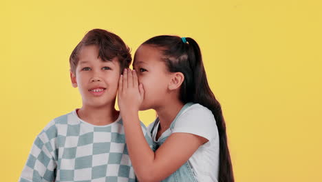 children sharing secrets