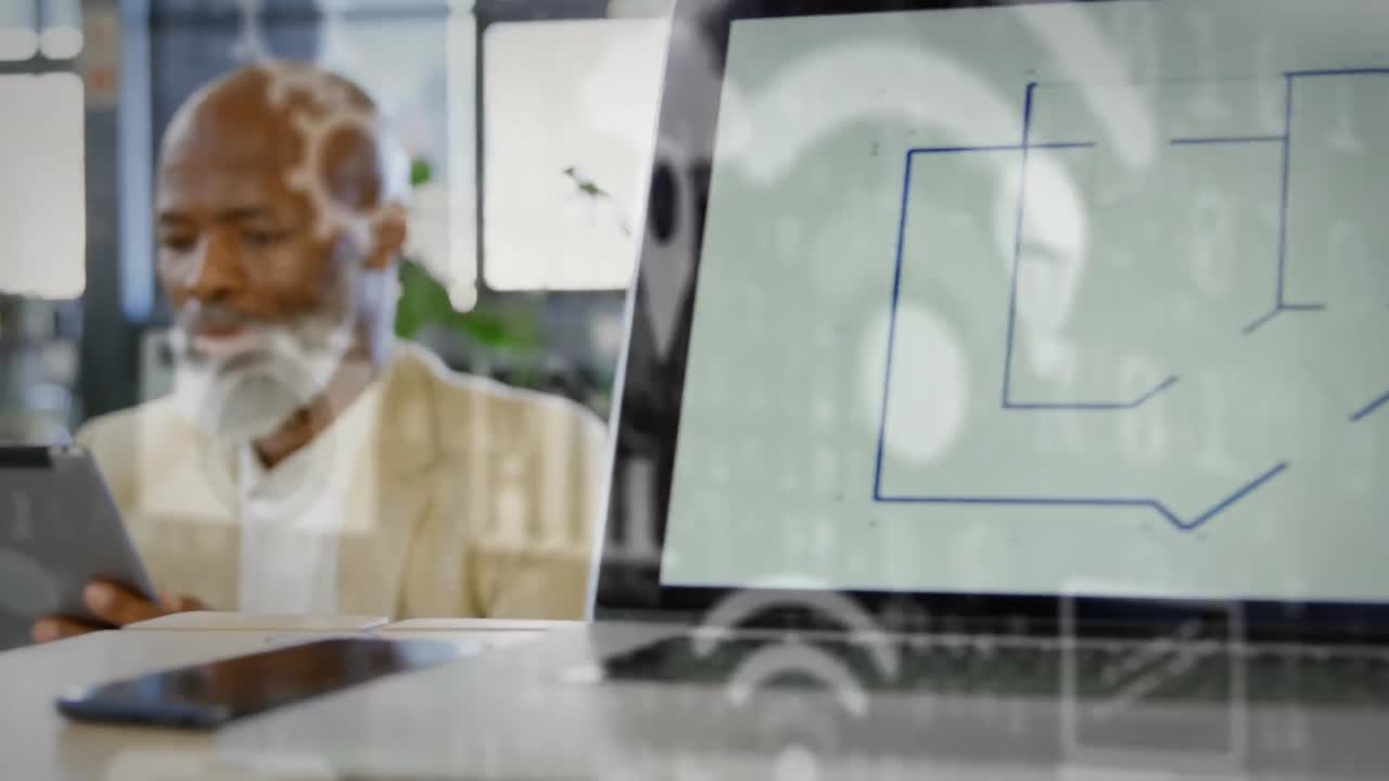 Animation of network of digital icons over businessman in office