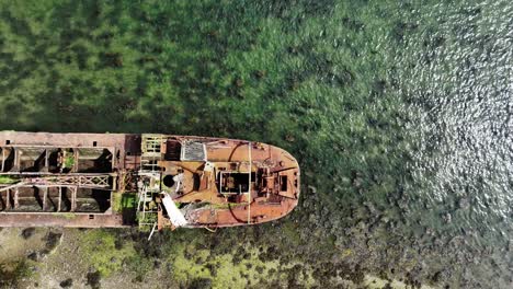 ireland epic locations drone flying slowly over rusting abandoned working boat bannow bay saltmills wexford ireland summer morning