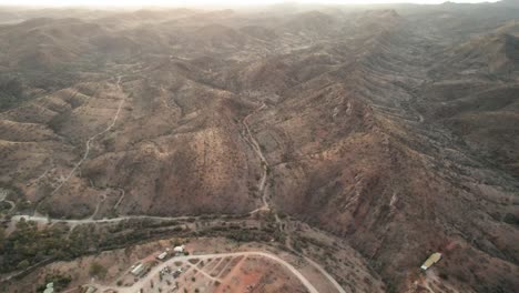 Arkaroola-village-view-from-above-with-Sprawling-mountain-peaks-as-background,-Australia