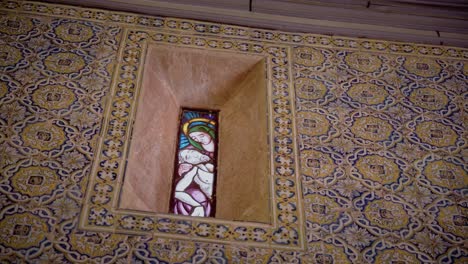 Old-stained-glass-with-our-lady-of-sorrow-holding-jesus-christ-from-a-old-sanctuary