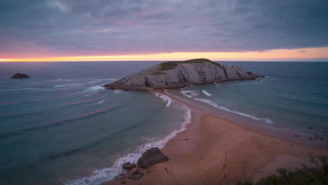 covachos island and beach during sunset in santander, cantabria, spain