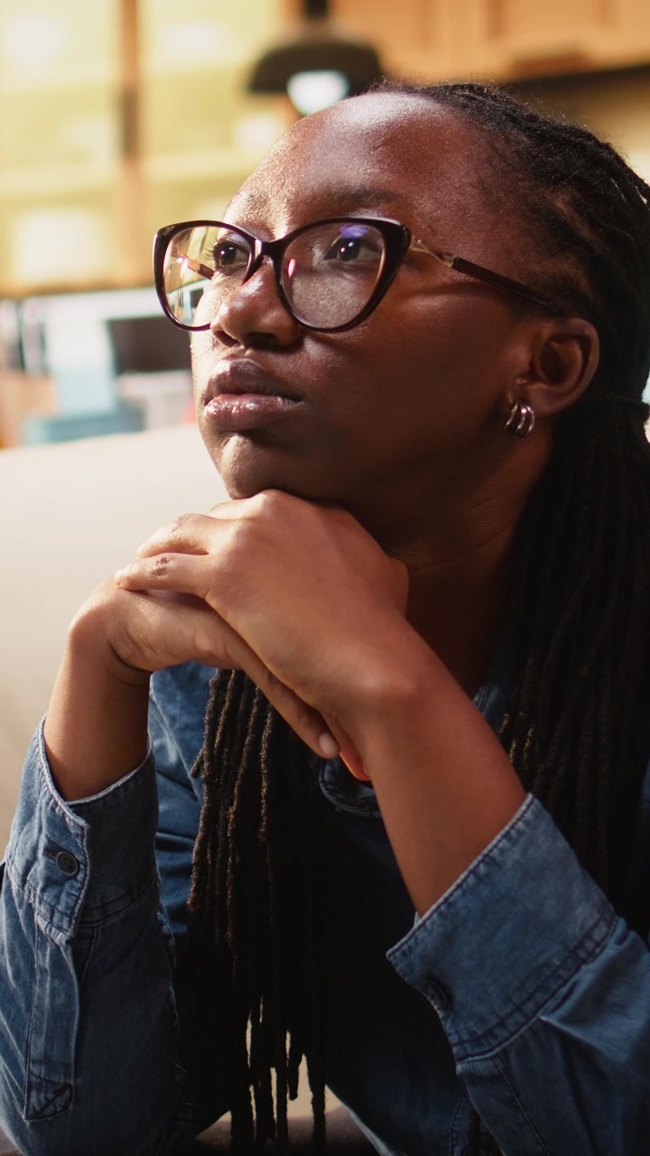 Vertical Video Bored woman with low energy being zoned out and discouraged