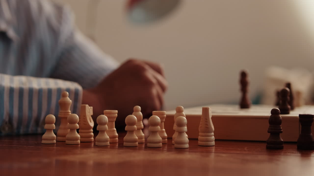 Girl Playing Chess on a Wooden Table