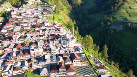 Aerial-view-of-mosque-with-two-tower-on-the-middle-of-village-house---Baituttaqwa-Mosque,-Nepal-Van-Java,-slope-of-Mount-Sumbing,-Indonesia