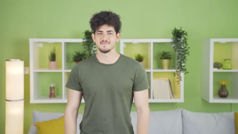 Portrait-of-cheerful-and-happy-young-man.