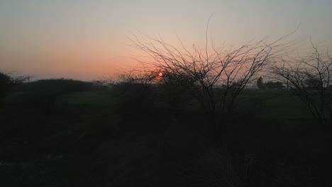 sunset in village left to right wide view