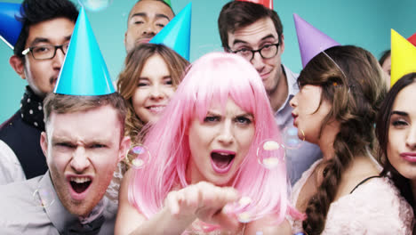 Multi-racial-group-of-happy-people-dancing-with-bubbles-slow-motion-party-photo-booth