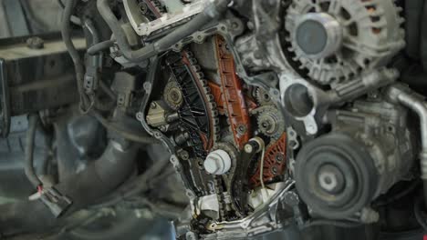 disassembled car engine in repair shop