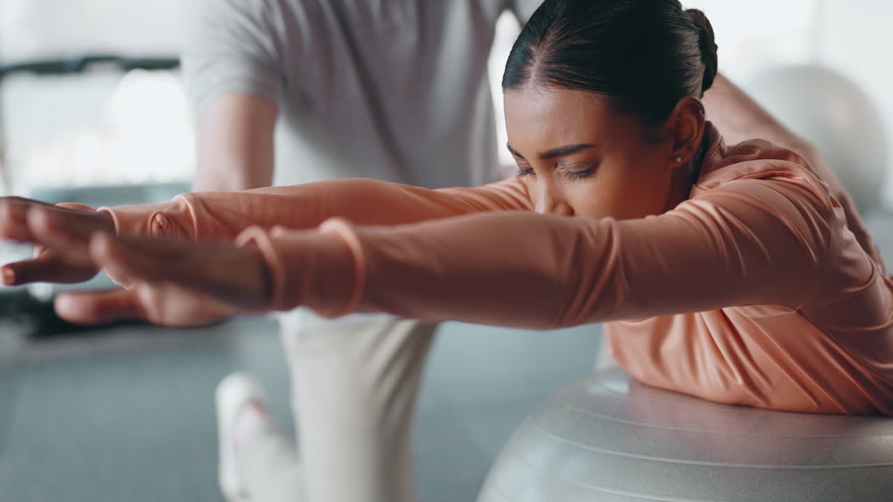 Physiotherapist, exercise ball