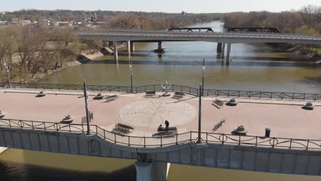 Aerial-View-of-Bridge-Walkway-Over-a-River