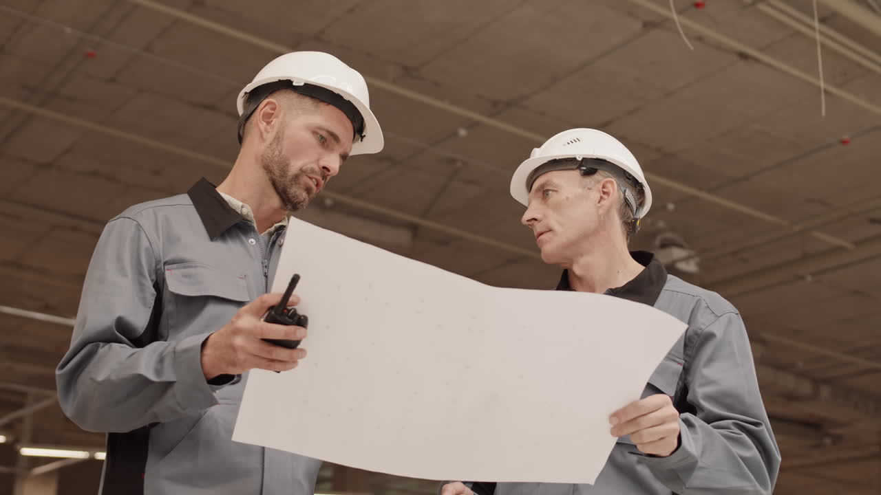 Foreman and Employee Arguing About Project