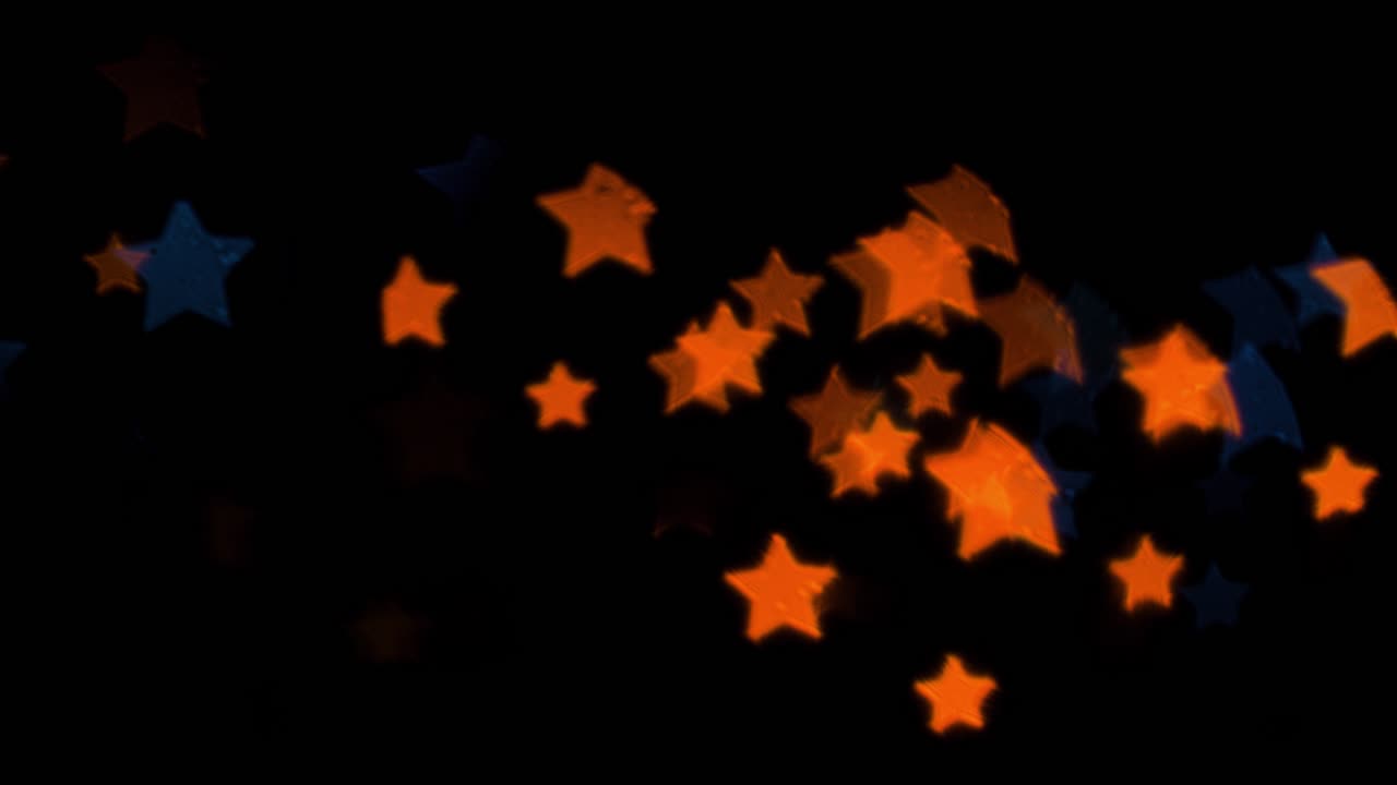 hermoso bokeh en forma de estrella de luces led parpadeantes, navidad, invierno, vacaciones o concepto de fondo de fiesta de glamour, espacio de copia