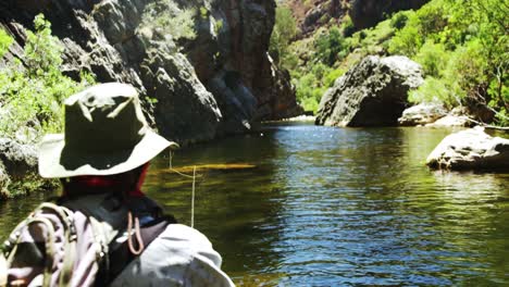 Fisherman-fly-fishing-in-river