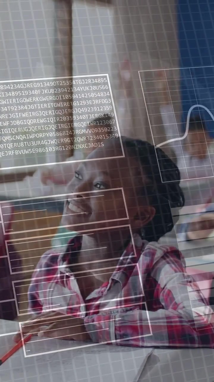 Vertical video: Pupil in red plaid raising hand after class prompt, HUD markers marking answer