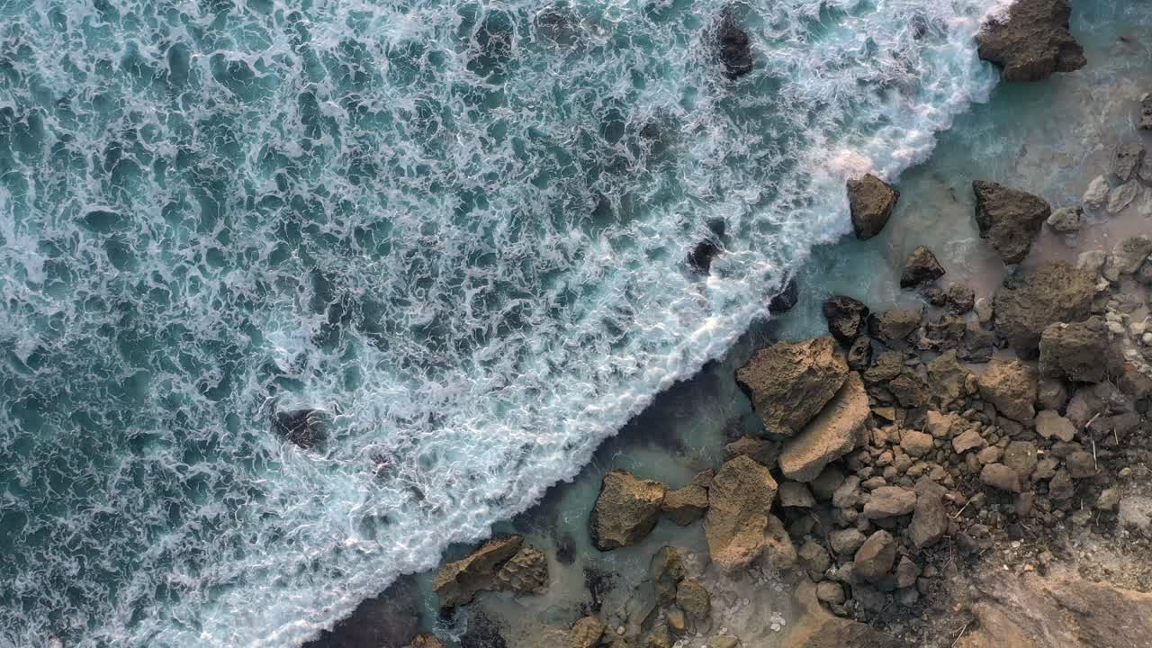 4K Aerial footage of Uluwatu temple and coast in Bali Indonesia