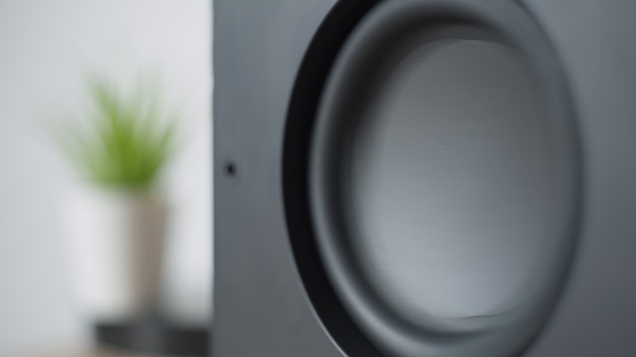 An Ikea subwoofer playing loud music, 4K
