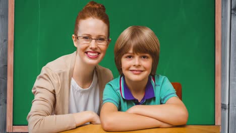 Animation-of-smiling-caucasian-female-teacher-and-schoolboy-over-board