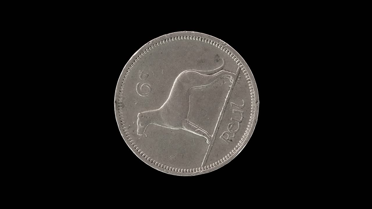 Ireland 1964 sixpence coin reverse with Irish wolfhound rotating on black background