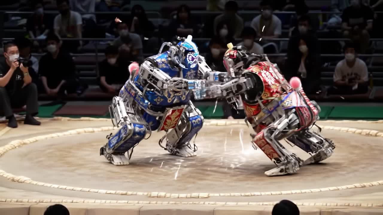 Two advanced robots compete in a thrilling wrestling match at a technology event, attracting a captivated audience. The atmosphere is filled with anticipation as the robots engage.