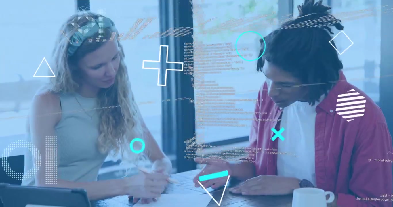 Man gesturing initiating code overlays while woman writing and both pointing software documents