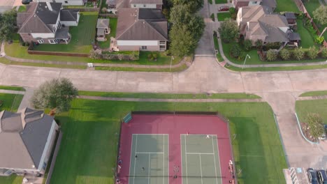 Aerial-of-middle-class-suburban-neighborhood-just-outside-of-Houston,-Texas