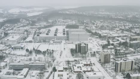 Drone-Aerial-views-of-the-student-town-Göttingen-during-winter-2021-in-heavy-snowfall