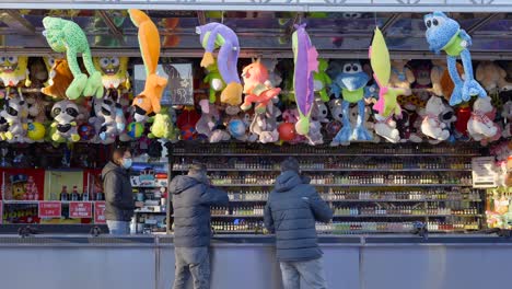 carnival game stall with prizes and alcohol