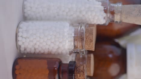 small bottles of homeopathic pellets