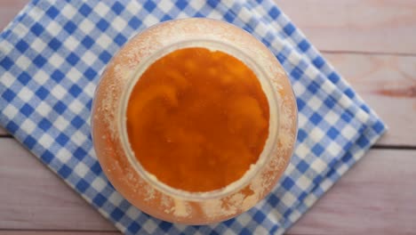 homemade ghee in container on a table