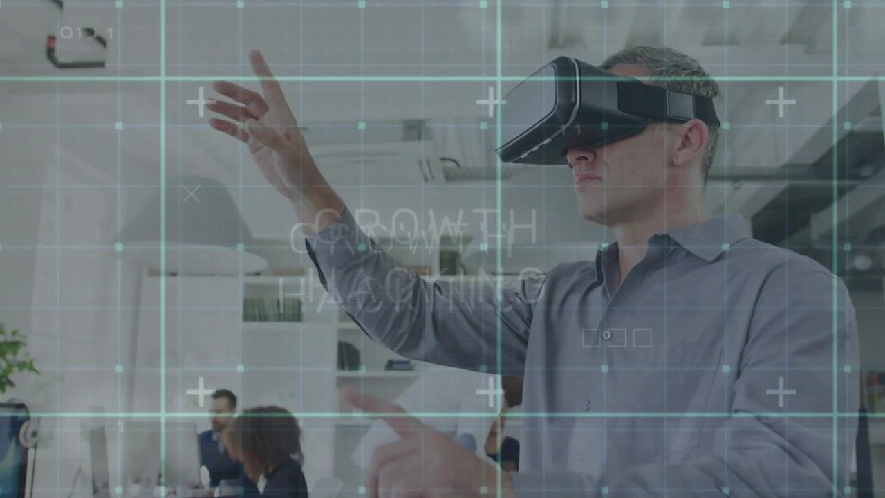 Male wearing VR headset pinching controls and resizing growth hacking chart in office for business