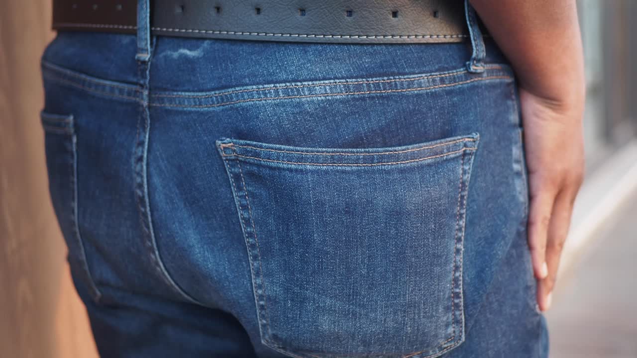 Man with a wallet in his back pocket