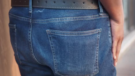 man with a wallet in his back pocket