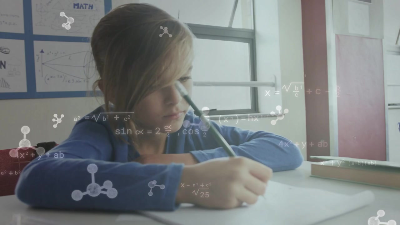 Male student touching pencil to paper, animated math equations appearing over page solving math