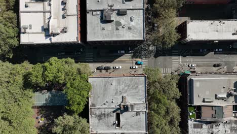 Overhead-view-lowering-over-an-urban-and-worn-down-city-street-in-Seattle,-Washington