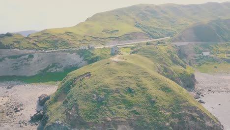 breathtaking aerial video of a cinematic wonderland of alapad rock formation in basco batanes in the philippines