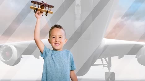 animation of happy caucasian boy playing with plane toy over plane