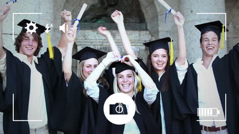 taking photos of students graduating on a digital camera