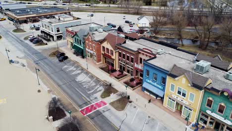 flyover of the downtown of a small beach town in the midwest