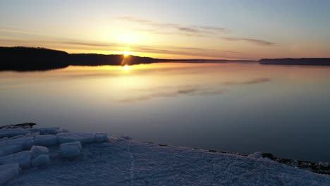 sunrise over a frozen river