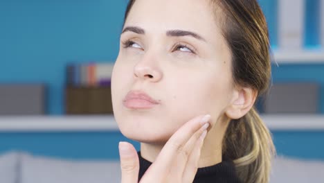 close-up of thoughtful young woman.