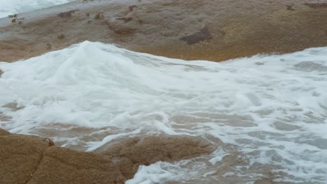 coast-by-the-sea-wave-flows-over-stones