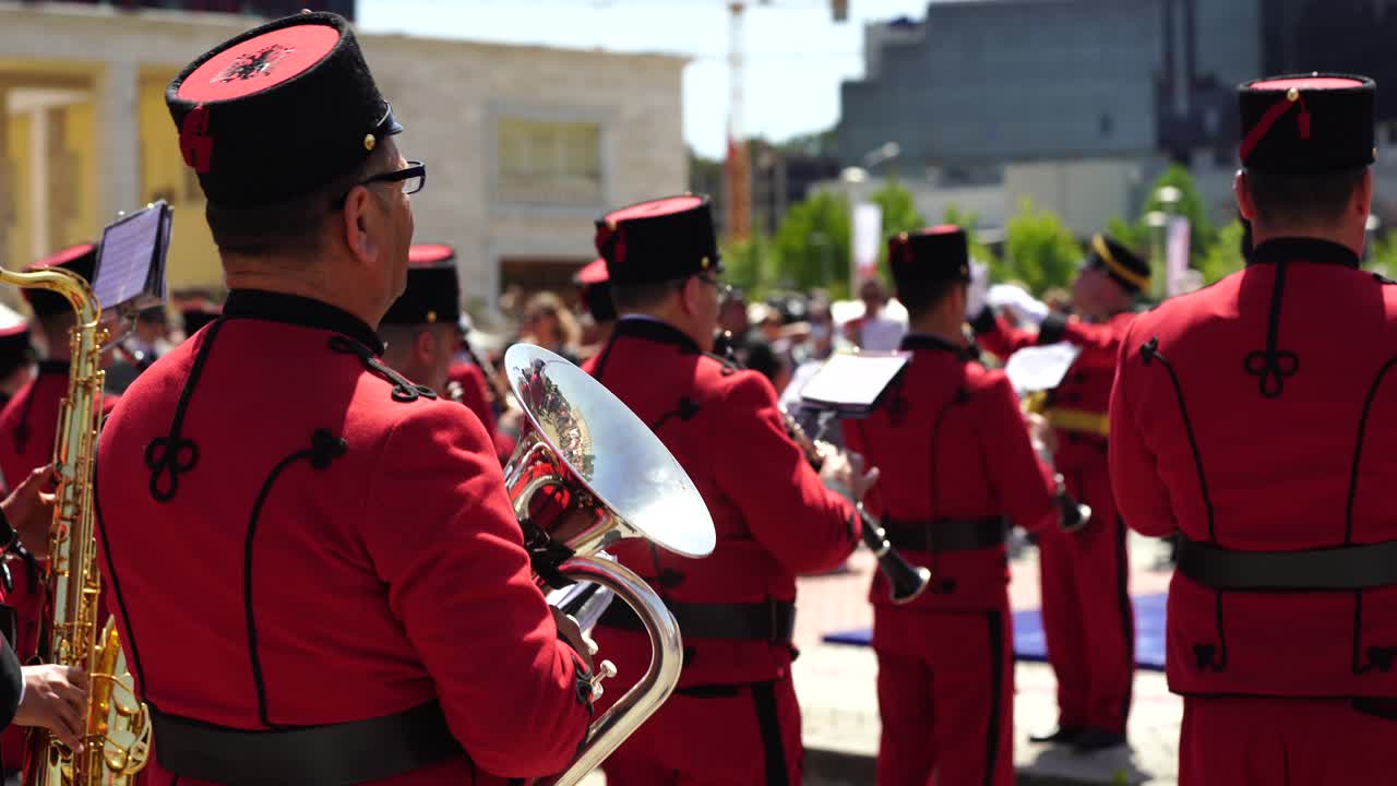 Brass band of Tirana performing music on military parade in main square