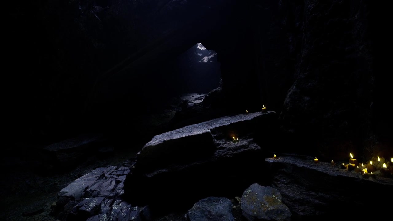 Ancient subterranean place of worship illuminated by solitary beam and candles