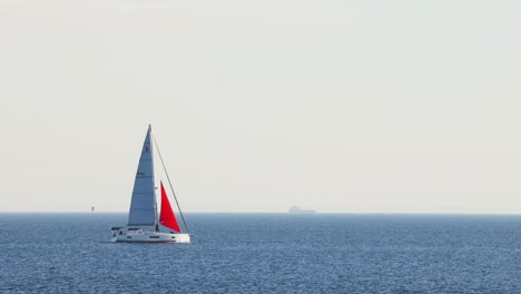 sailboat gliding across calm ocean waters