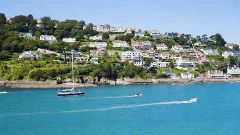 coastal town with boats and houses