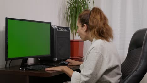 young woman videoconferencing distance chatting by web cam and laughing using computer virtual chat app on laptop screen. social distancing communication.