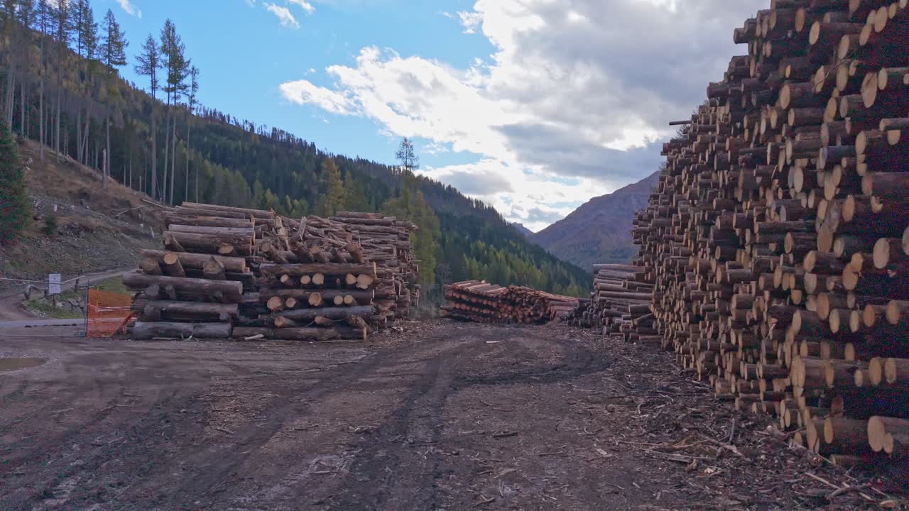 Top-down view of timber storage in natural Dolomite landscape