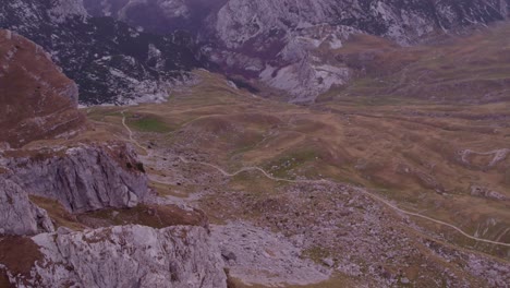 wide shot of durmitor national park montenegro mountain peaks with clouds, aerial